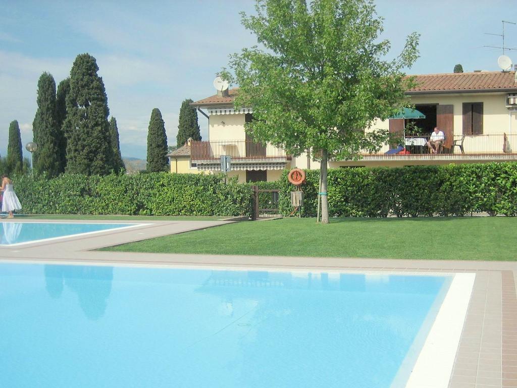 Belvilla By Oyo Enticing Holiday Home With Pool Lazise Exteriör bild