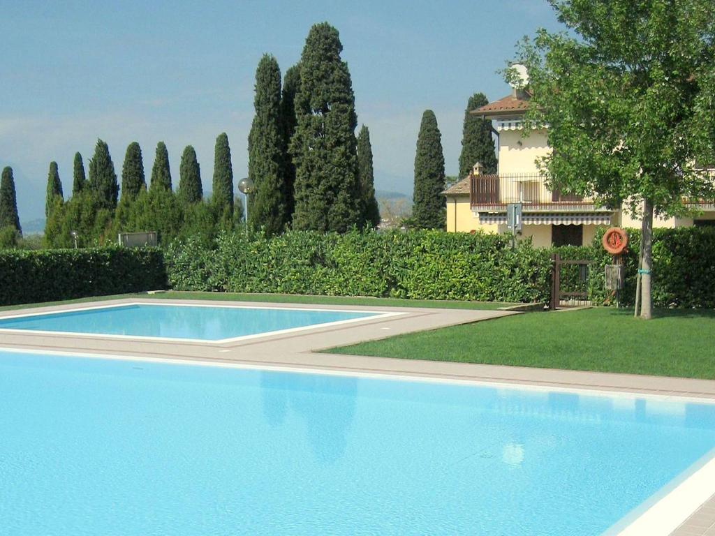 Belvilla By Oyo Enticing Holiday Home With Pool Lazise Exteriör bild